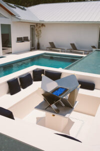 Design your luxury pools area with thoughtfully placed seating areas
